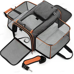 Gray pet carrier with orange accents on a white background