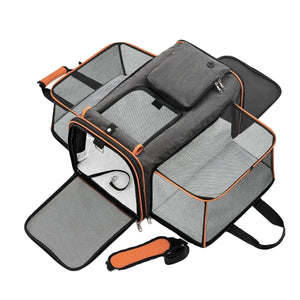 Gray pet carrier with orange accents on a white background
