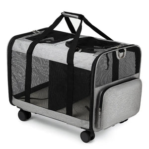 Gray pet carrier with wheels on a white background